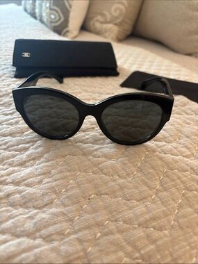CHANEL Black Cat-Eye Sunglasses with Dark Lenses